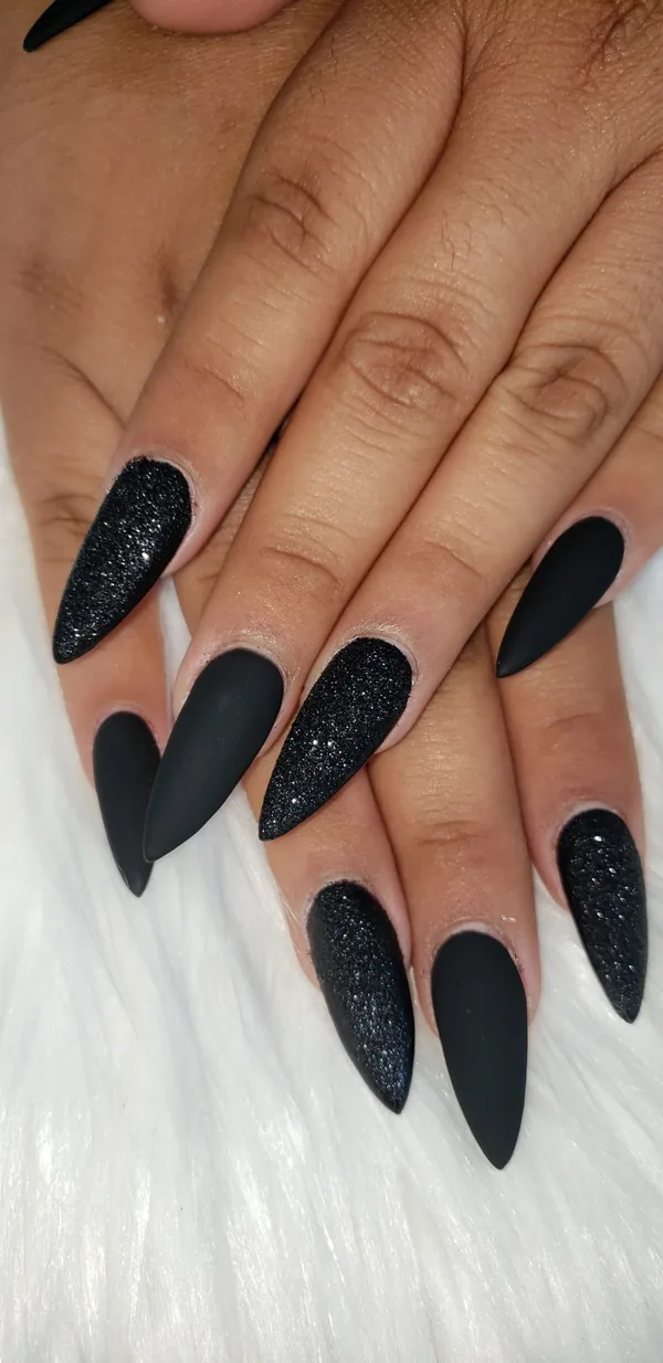 Matte black stiletto nails