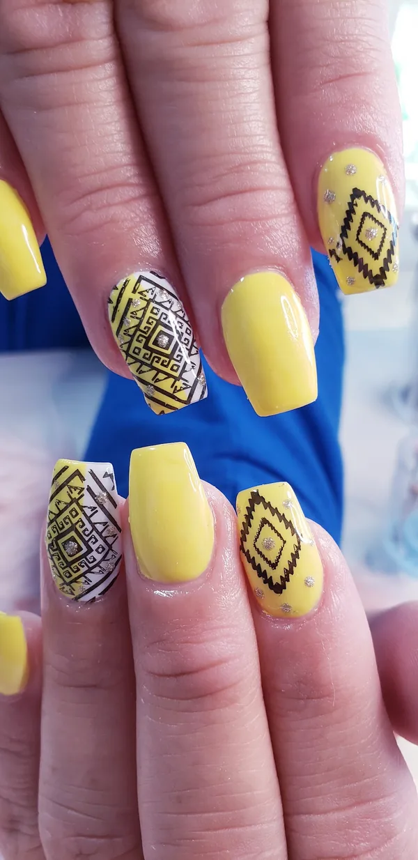 Sunflower yellow nails with black line art